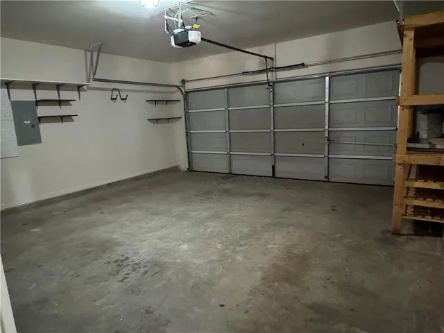 a view of a room with a garage