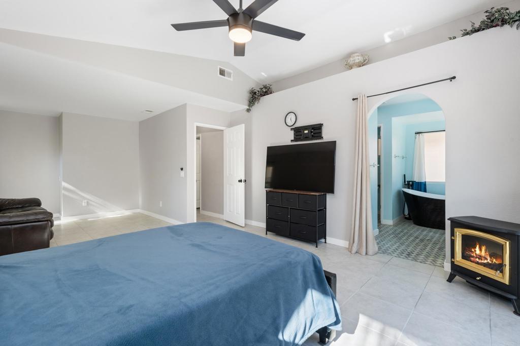 5331 Mead Street Oceanside, CA 92056 - Photo 13 of 29 a bedroom with a bed and a television