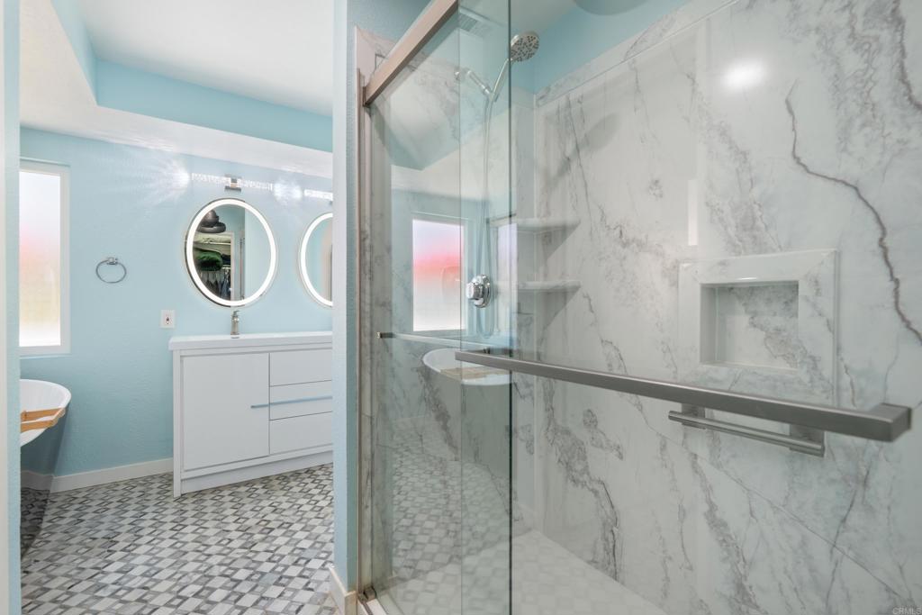 5331 Mead Street Oceanside, CA 92056 - Photo 18 of 29 a bathroom with a sink a toilet and shower