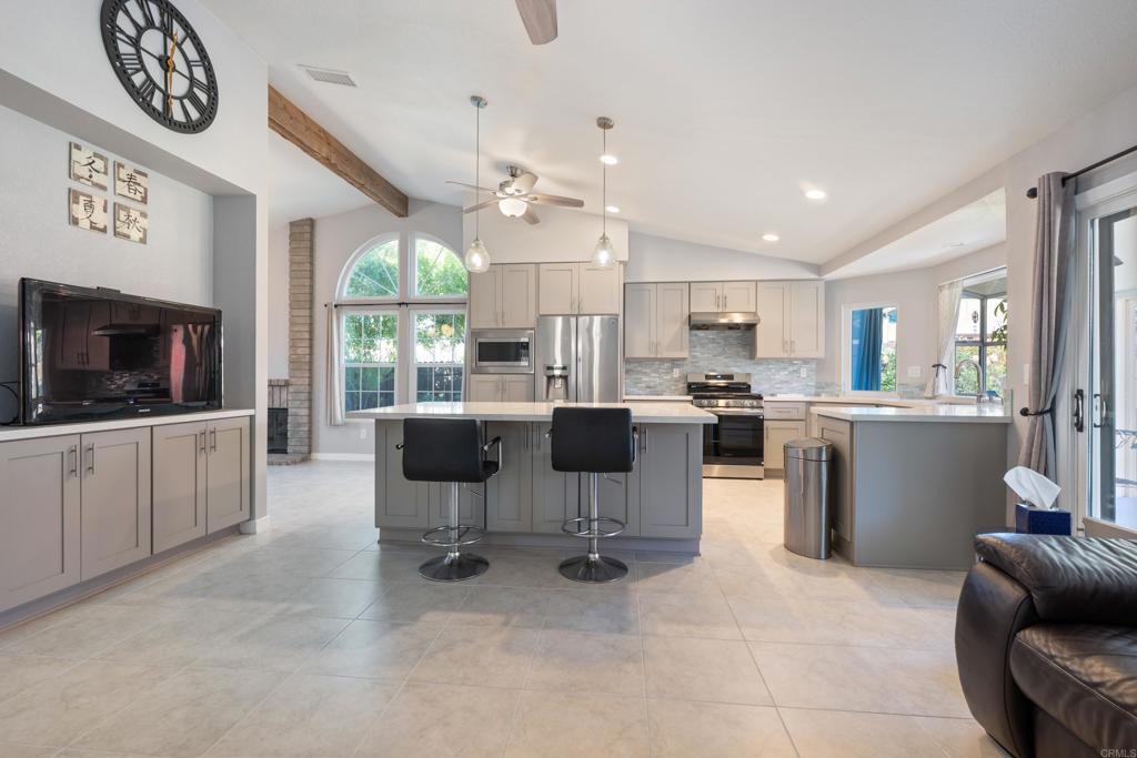 5331 Mead Street Oceanside, CA 92056 - Photo 20 of 29 a open kitchen with cabinets a sink and a stove