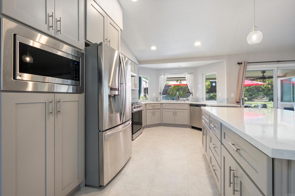 5331 Mead Street Oceanside, CA 92056 - Photo 21 of 29 a kitchen with stainless steel appliances a refrigerator and a microwave