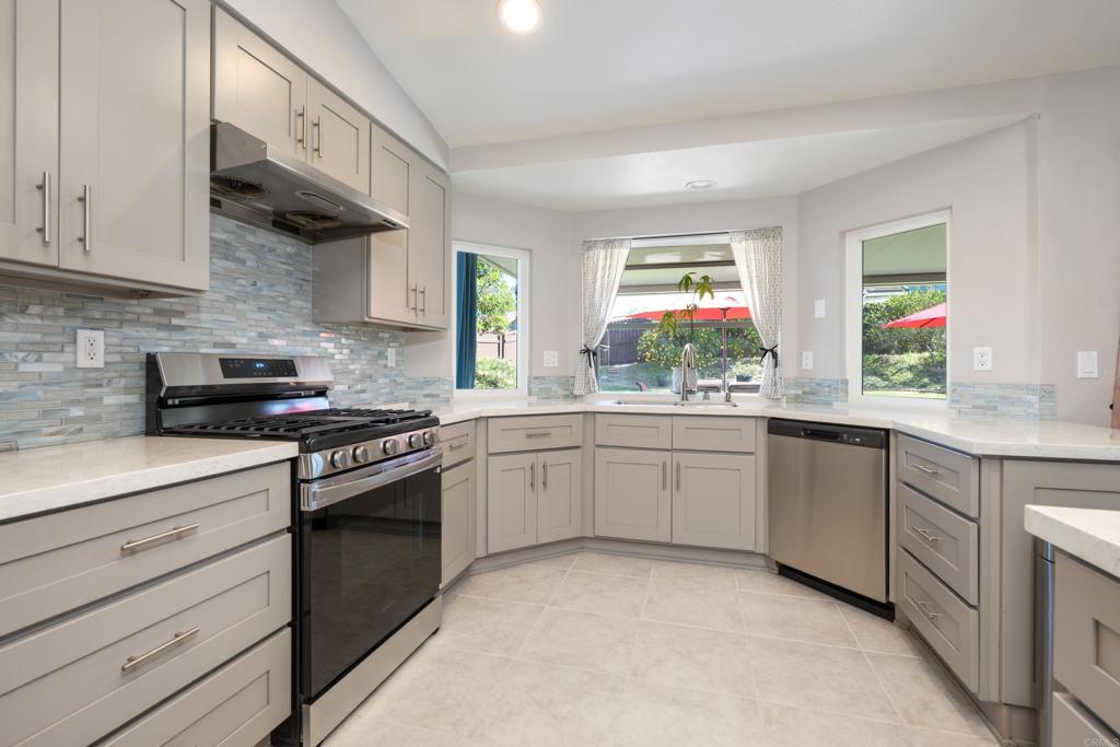 5331 Mead Street Oceanside, CA 92056 - Photo 22 of 29 a kitchen with cabinets appliances a sink and a window