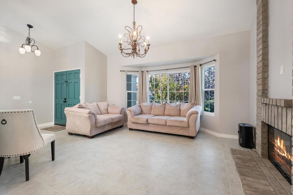 5331 Mead Street Oceanside, CA 92056 - Photo 4 of 29 a living room with furniture and a fireplace