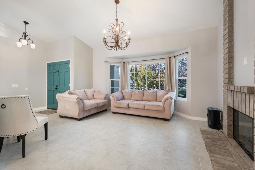 5331 Mead Street Oceanside, CA 92056 - Photo 5 of 29 a living room with furniture and a large window