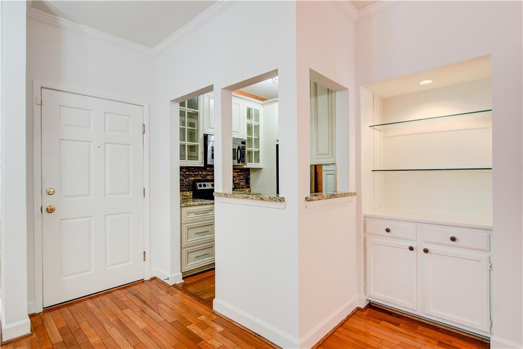 2865 Lenox Road Northeast, Unit 102 Atlanta, GA 30324 - Photo 4 of 35 wooden floor in an empty room