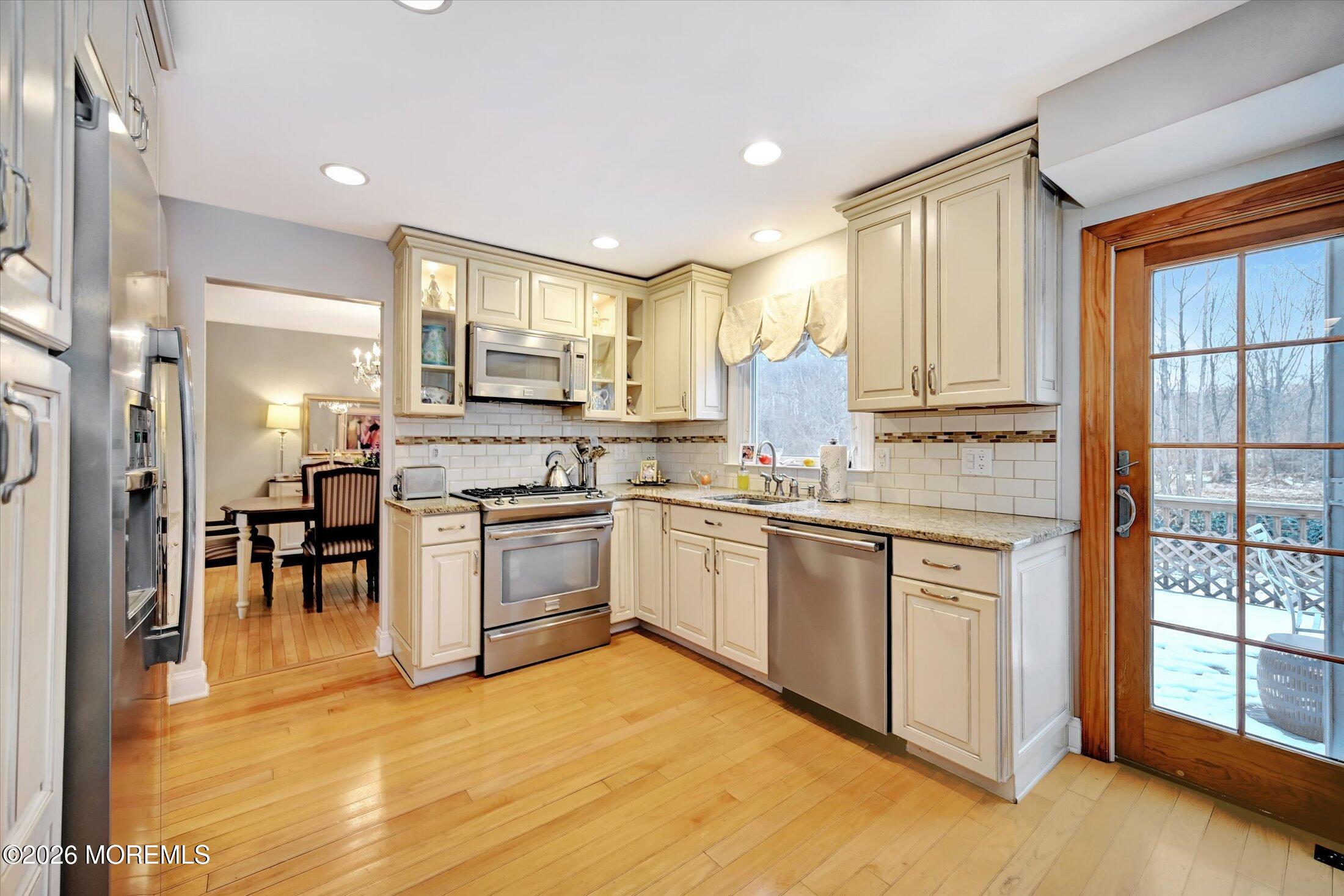 18 Devon Drive Manalapan, NJ 07726 - Photo 13 of 40 10-Kitchen to Dining Room