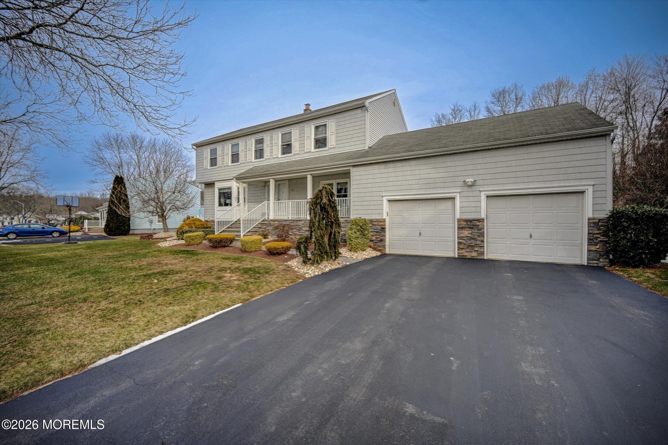 18 Devon Drive Manalapan, NJ 07726 - Photo 2 of 40 56-Driveway