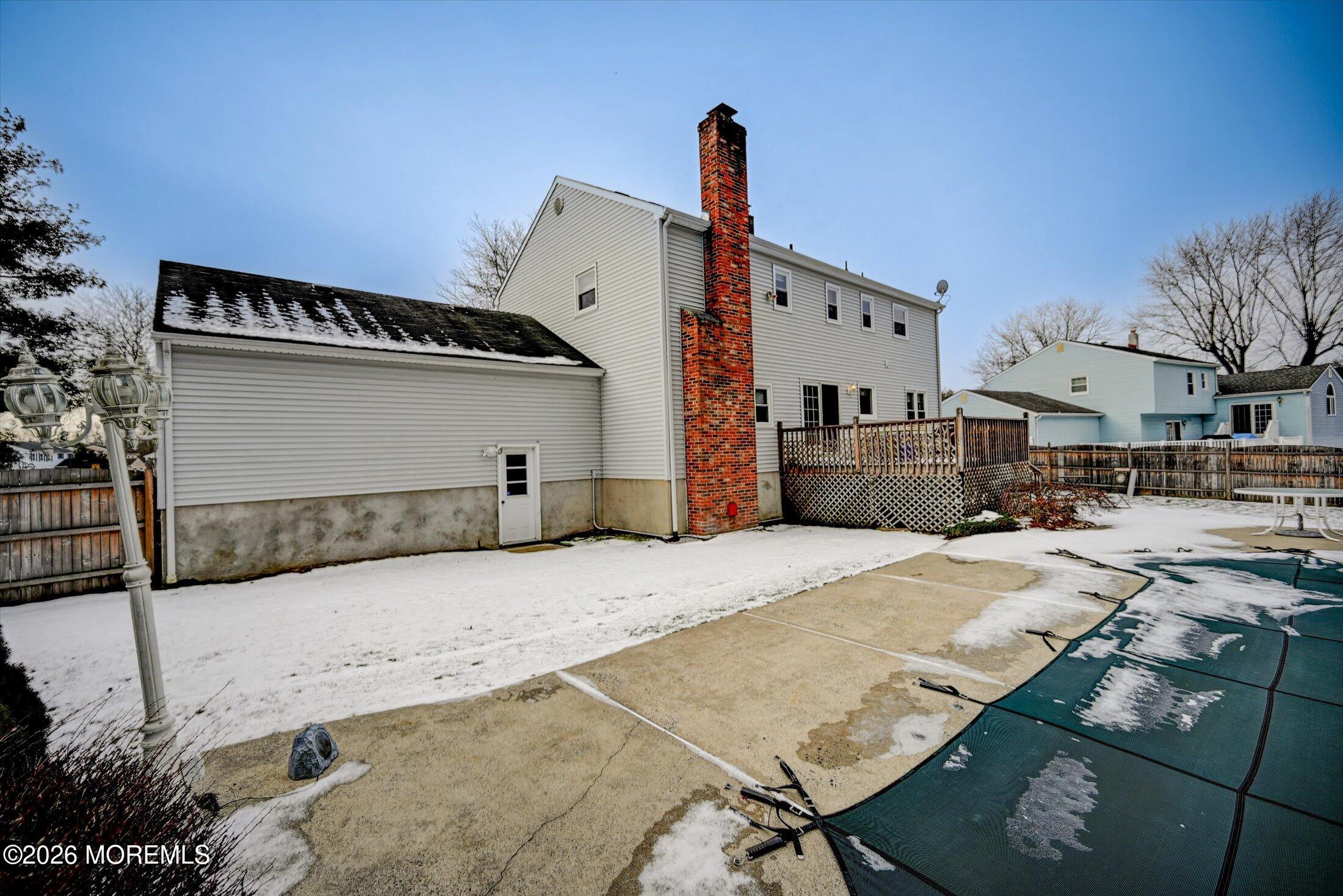 18 Devon Drive Manalapan, NJ 07726 - Photo 40 of 40 49-Back of Home- Side View