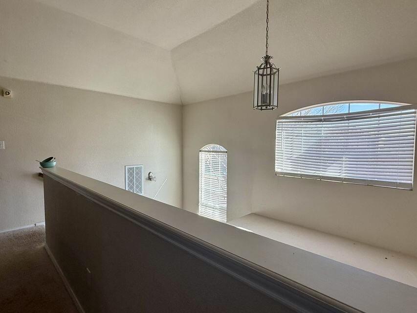 5028 Itasca Street Lubbock, TX 79416 - Photo 6 of 10 a view of a hallway with a window