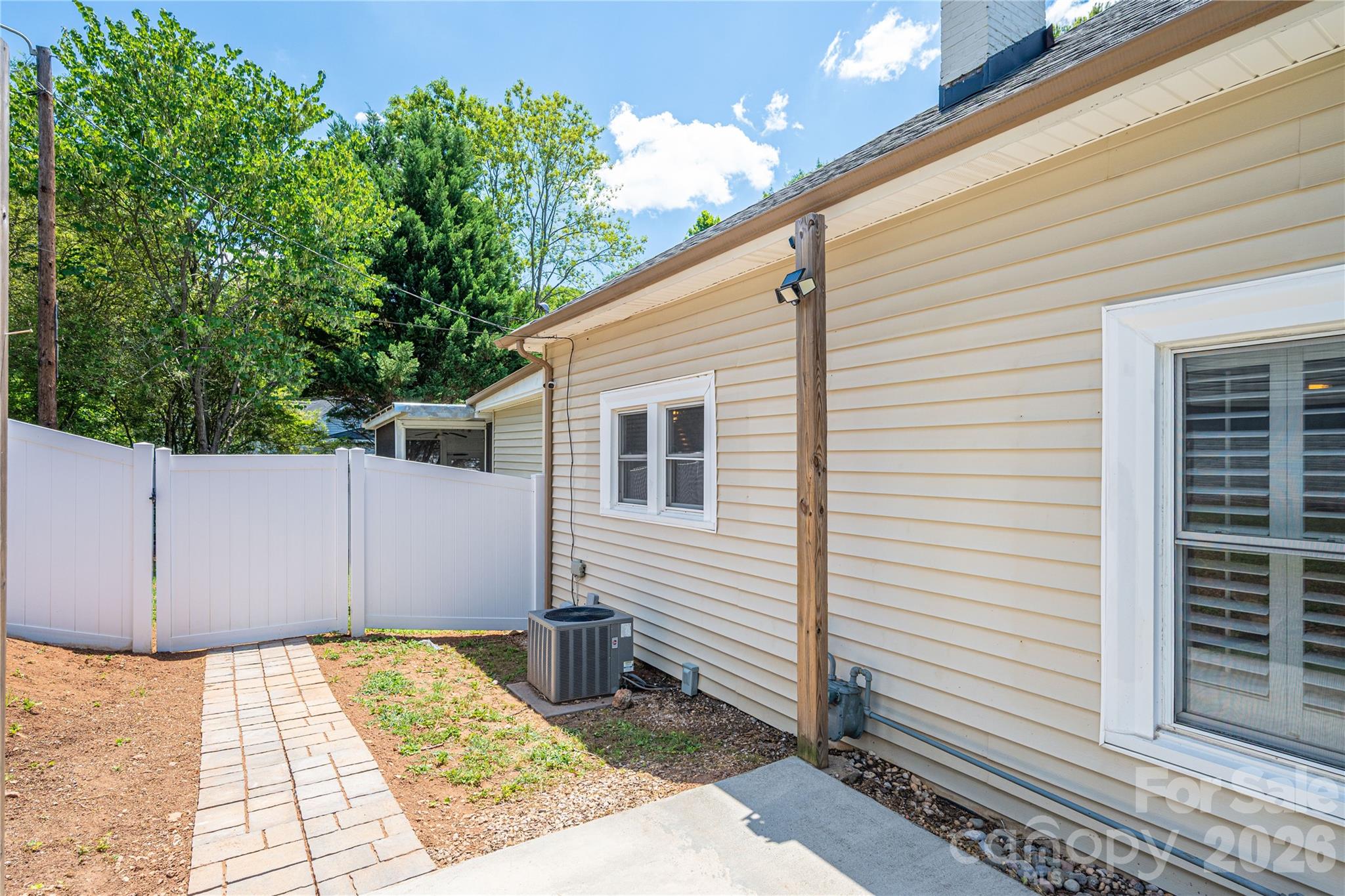 58 Fourth Street Cramerton, NC 28032 - Photo 42 of 44 a view of a backyard with sitting area