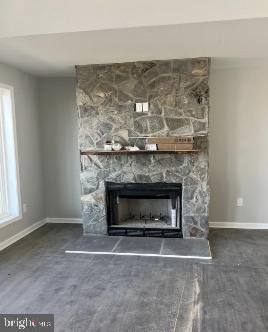 242 Howellsville Road Front Royal, VA 22630 - Photo 7 of 7 Cozy stone fireplace as a focal point.