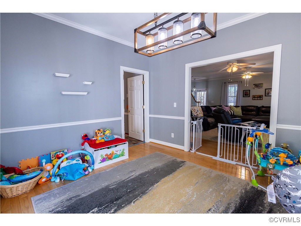 1047 Camera Road Waverly, VA 23890 - Photo 16 of 48 a bedroom with furniture and a baby crib