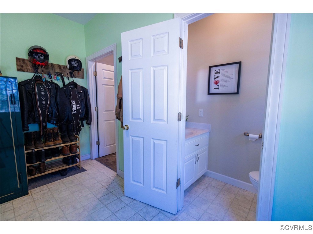 1047 Camera Road Waverly, VA 23890 - Photo 17 of 48 a view of an entryway with wooden floor