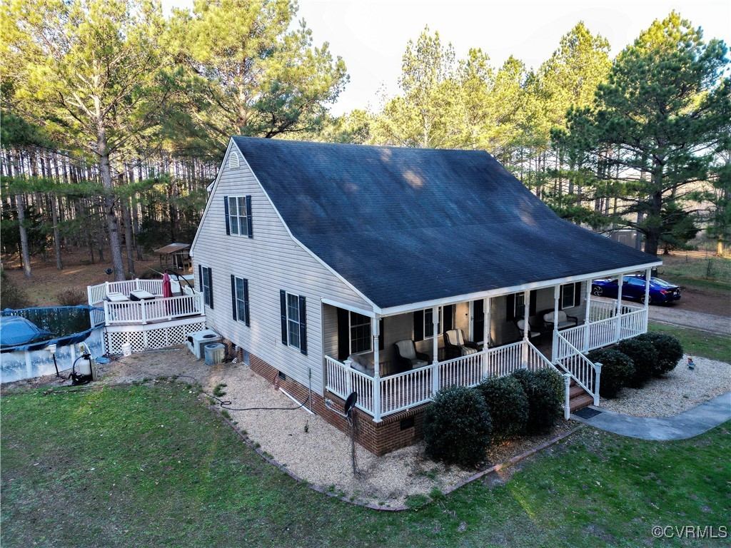 1047 Camera Road Waverly, VA 23890 - Photo 2 of 48 a view of a house with backyard and sitting area