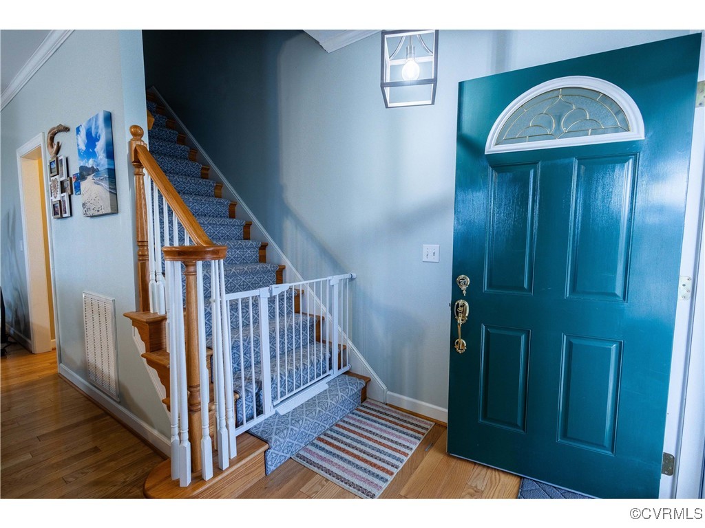 1047 Camera Road Waverly, VA 23890 - Photo 21 of 48 a view of entryway with wooden floor