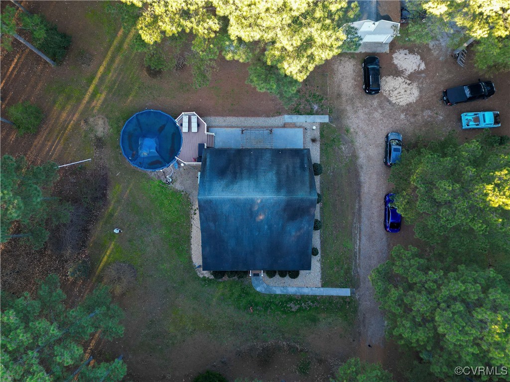 1047 Camera Road Waverly, VA 23890 - Photo 43 of 48 an aerial view of a house with garden space and sitting area
