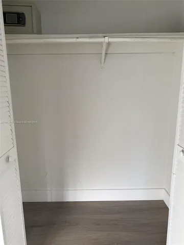 a view of small space with racks on the wall