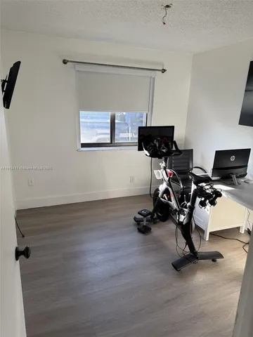 a view of workspace with gym equipment