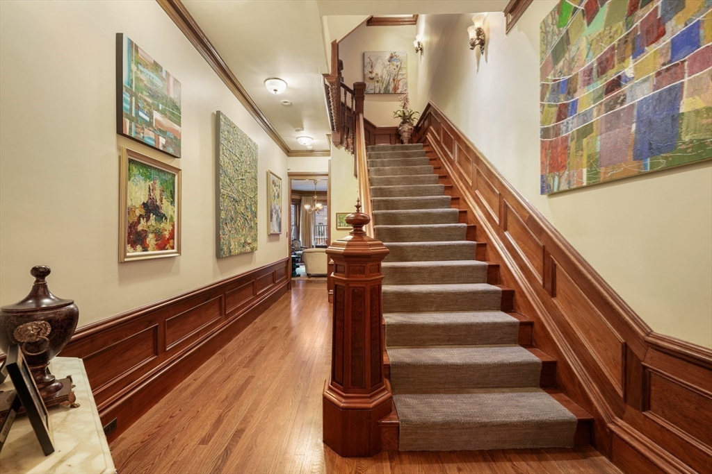 381 Beacon Street Boston, MA 02116 - Photo 18 of 21 a view of entryway and hall with wooden floor