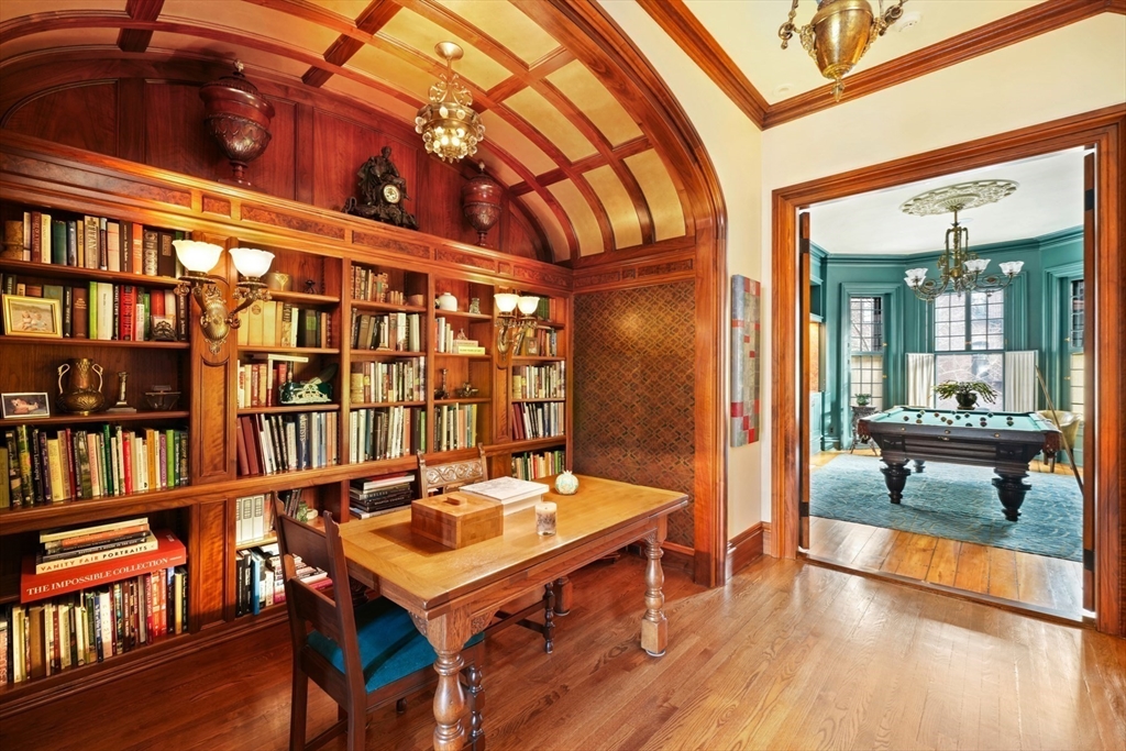 381 Beacon Street Boston, MA 02116 - Photo 7 of 21 a view of a room with furniture and wooden floor