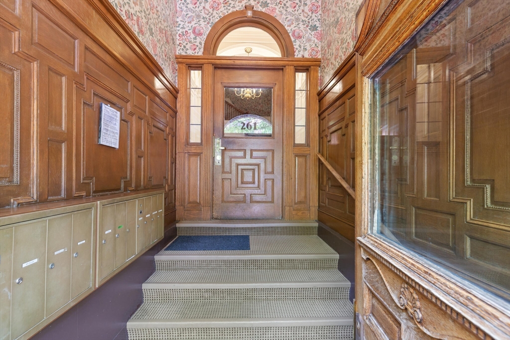261 Marlborough Street, Unit 4R Boston, MA 02116 - Photo 29 of 36 a view of an entryway with wooden floor and a front door