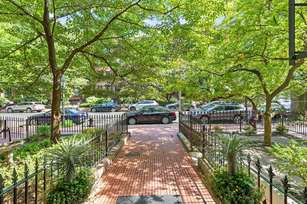 261 Marlborough Street, Unit 4R Boston, MA 02116 - Photo 32 of 36 a view of swimming pool with outdoor seating and plants