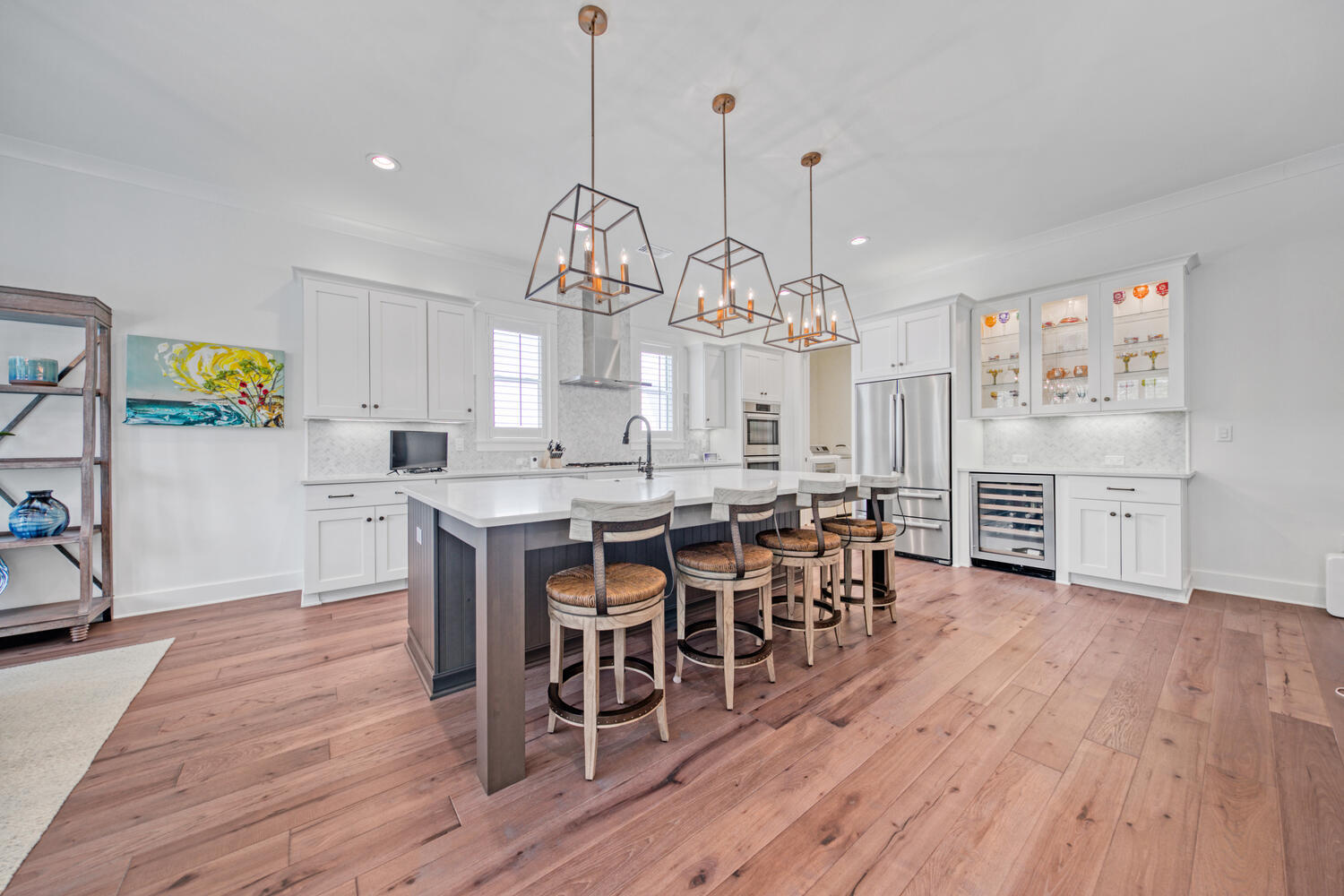 235 Ridgewalk Circle Santa Rosa Beach, FL 32459 - Photo 13 of 44 a view of a dining room and livingroom with furniture wooden floor a chandelier