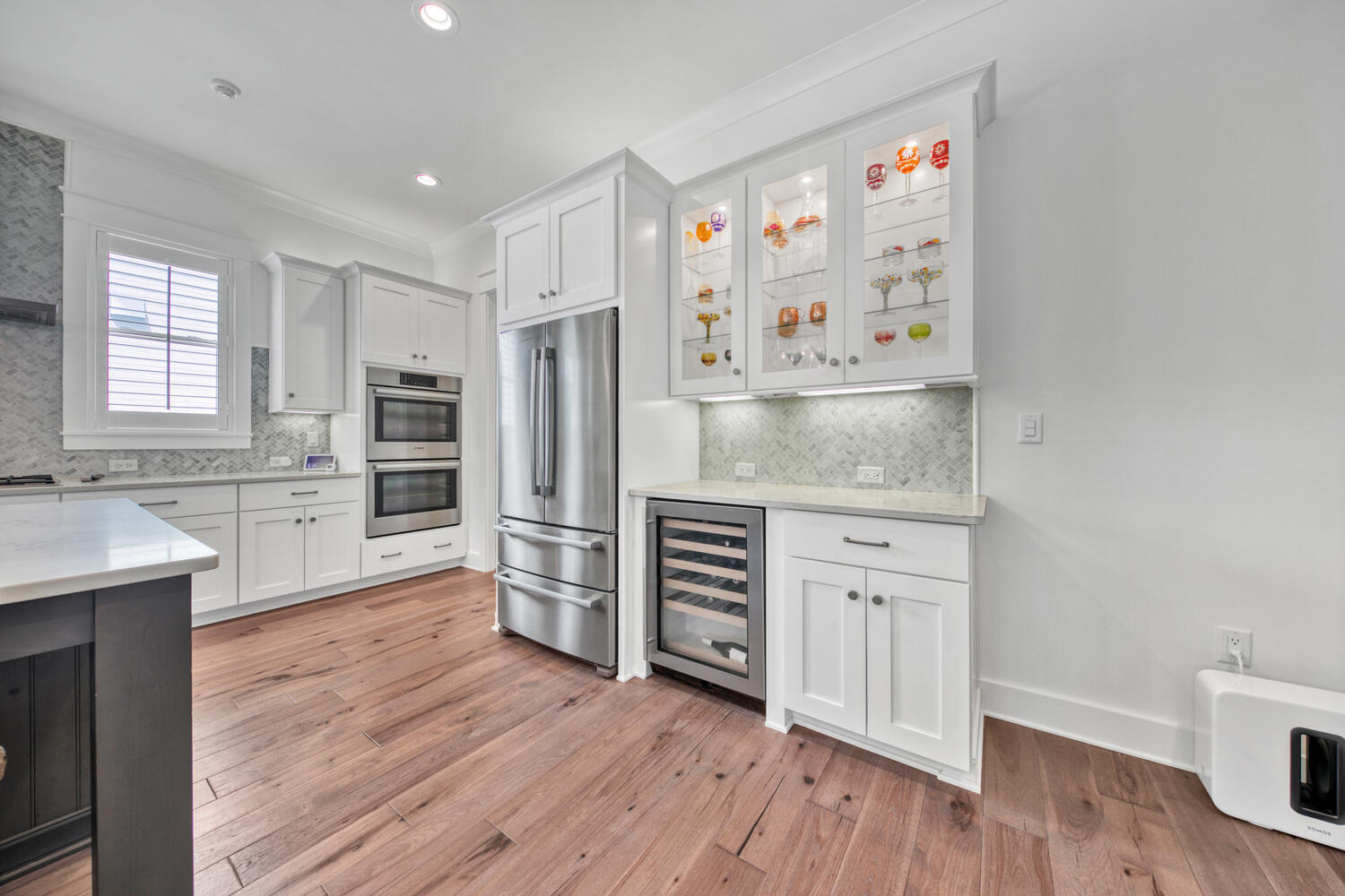 235 Ridgewalk Circle Santa Rosa Beach, FL 32459 - Photo 14 of 44 a kitchen with stainless steel appliances a refrigerator and a stove top oven
