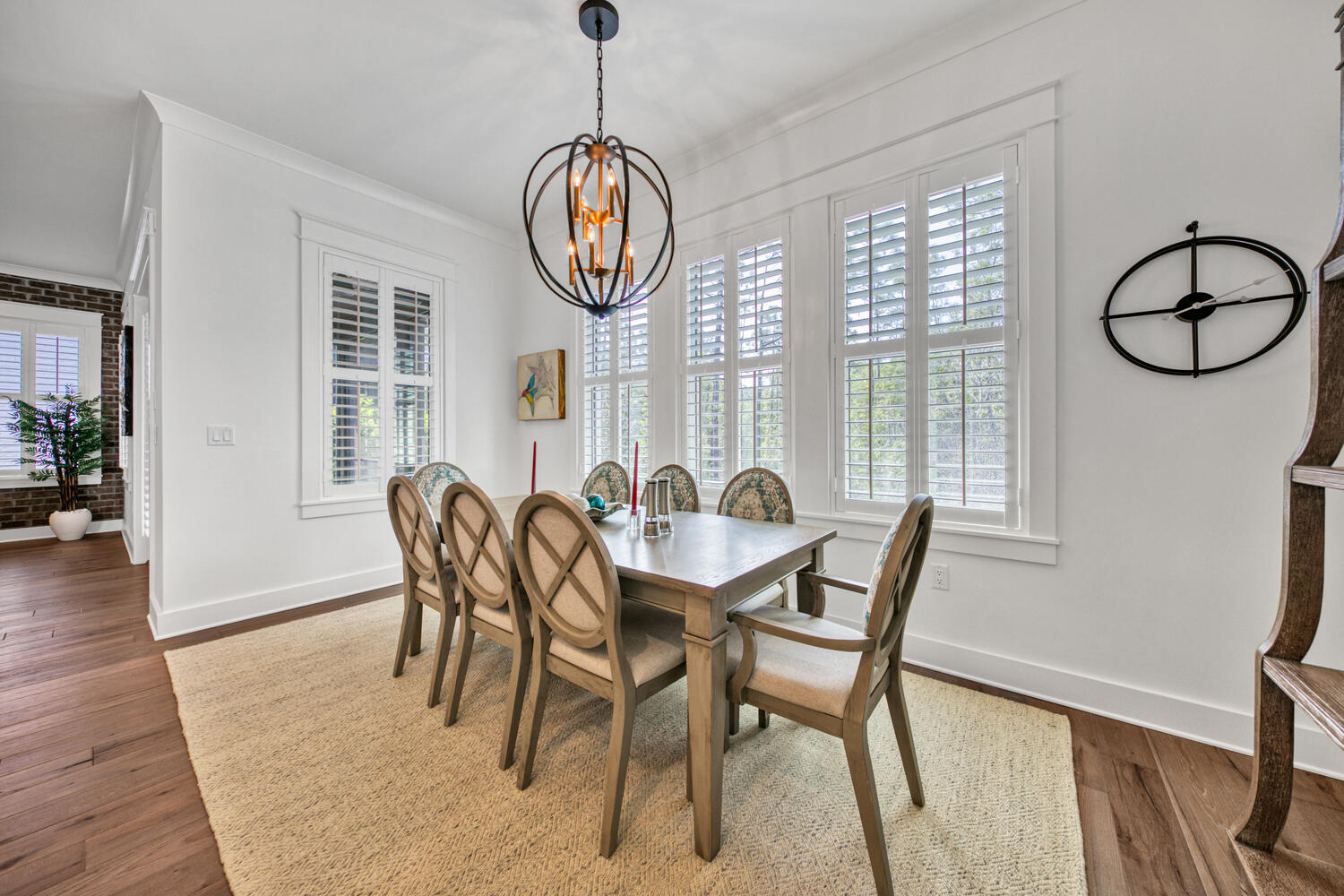 235 Ridgewalk Circle Santa Rosa Beach, FL 32459 - Photo 16 of 44 a view of a dining room with furniture window and wooden floor