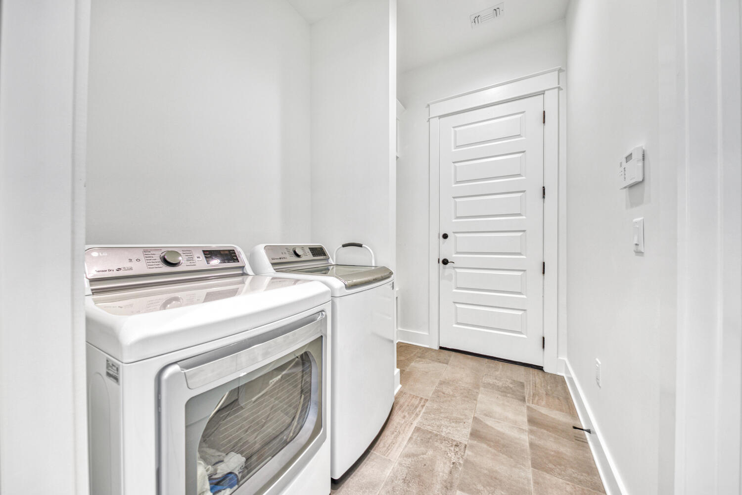 235 Ridgewalk Circle Santa Rosa Beach, FL 32459 - Photo 20 of 44 a utility room with dryer and washer