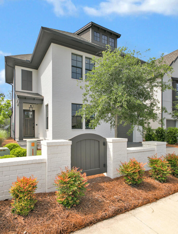 235 Ridgewalk Circle Santa Rosa Beach, FL 32459 - Photo 27 of 44 a view of a house with a yard and plants