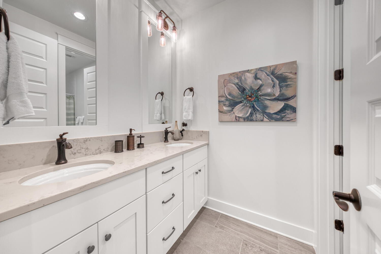 235 Ridgewalk Circle Santa Rosa Beach, FL 32459 - Photo 30 of 44 a bathroom with a double vanity sink and a mirror