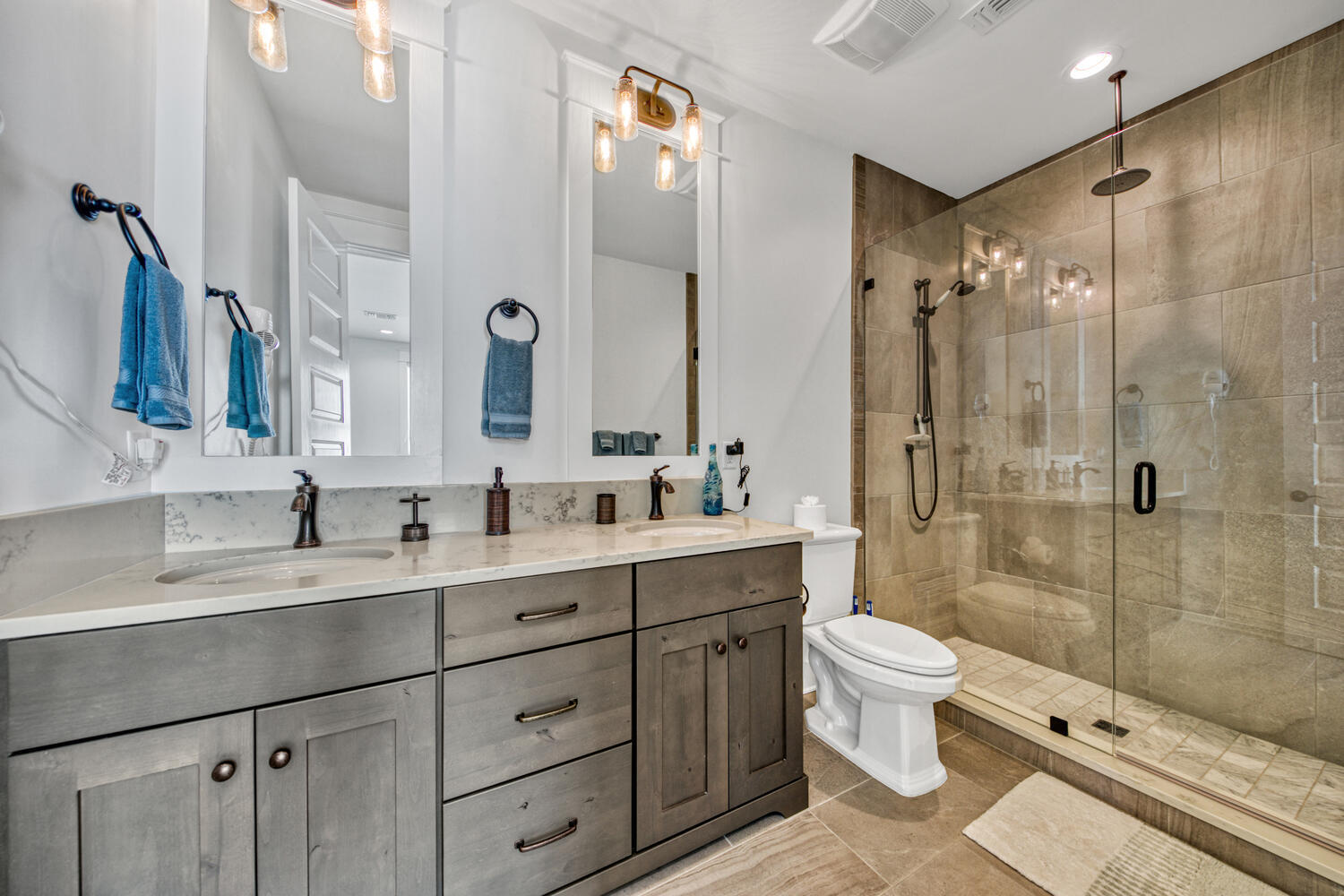 235 Ridgewalk Circle Santa Rosa Beach, FL 32459 - Photo 37 of 44 a bathroom with a double vanity sink toilet and shower