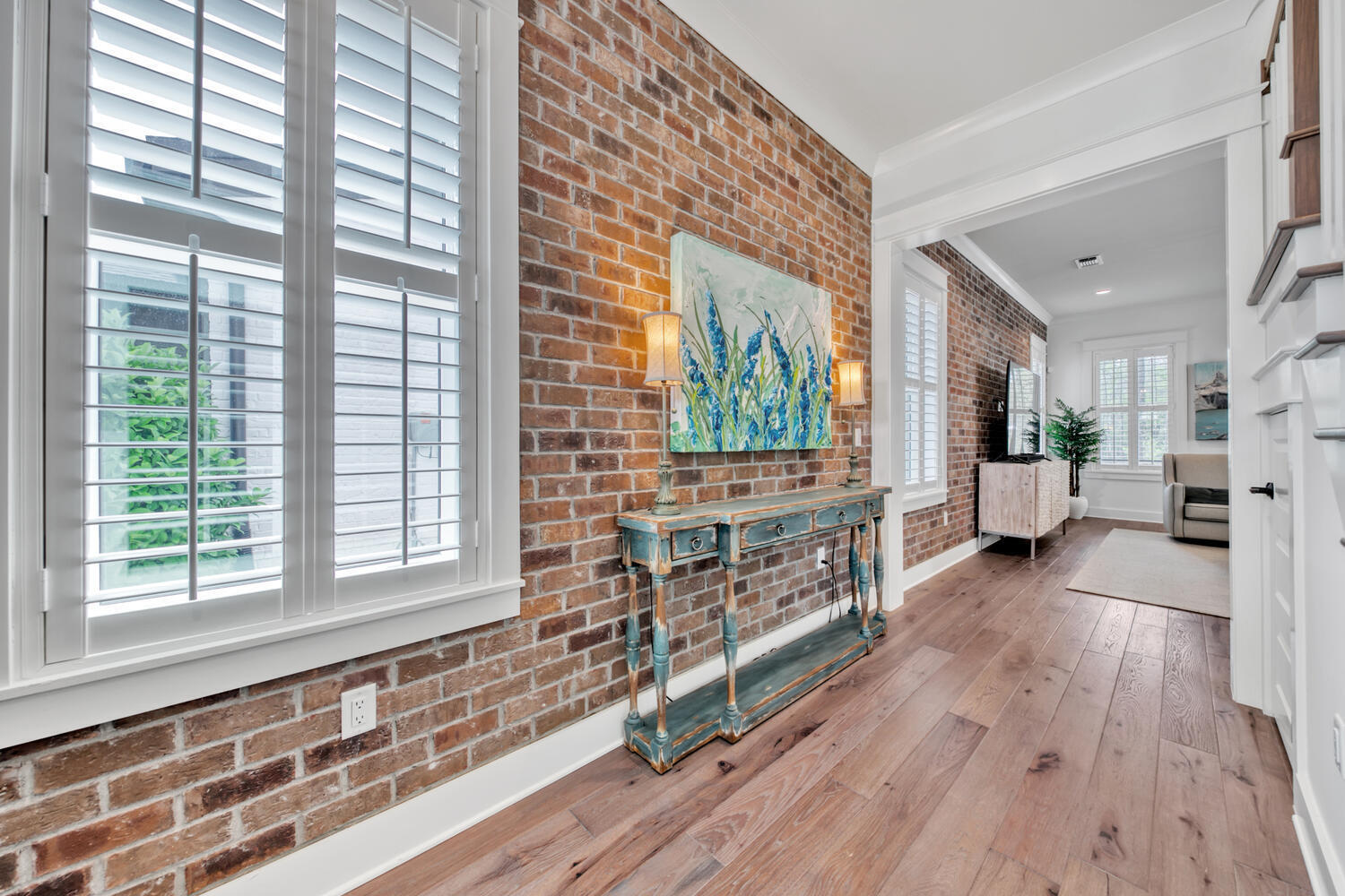 235 Ridgewalk Circle Santa Rosa Beach, FL 32459 - Photo 4 of 44 a living room with furniture and a wooden floor