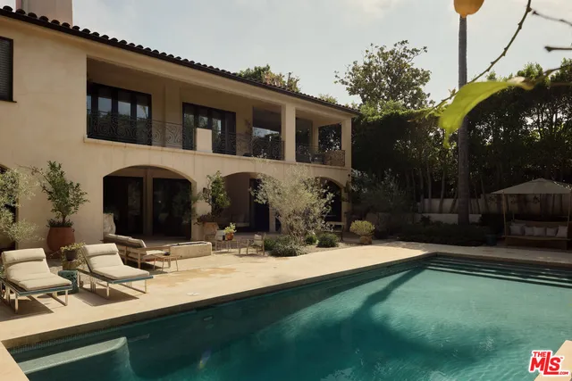 a view of a house with yard porch and furniture
