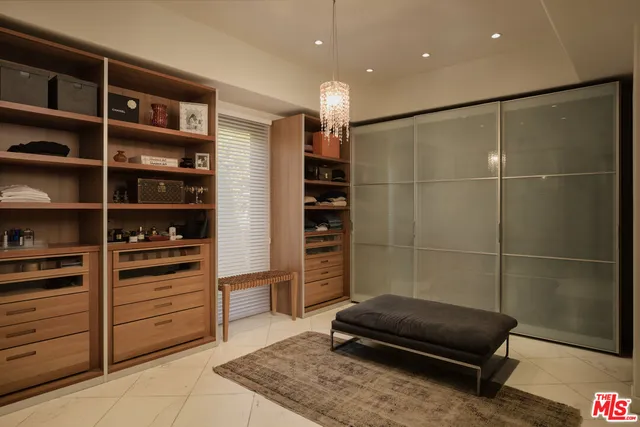a bathroom with a tub and a shower