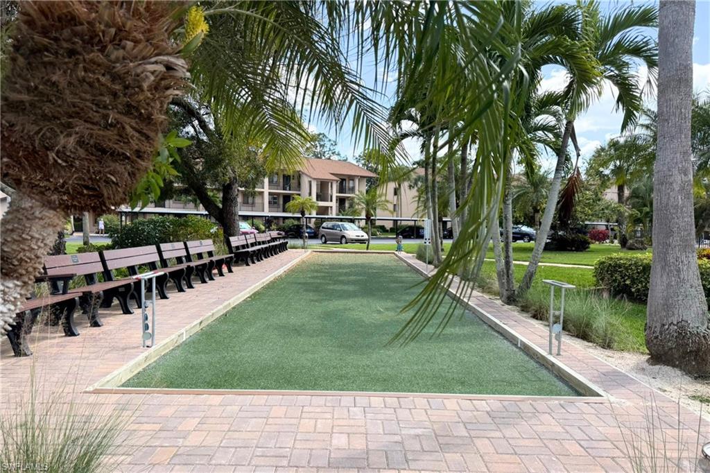 7360 St Ives Way, Unit 2205 Naples, FL 34104 - Photo 35 of 37 a view of a park with plants and trees
