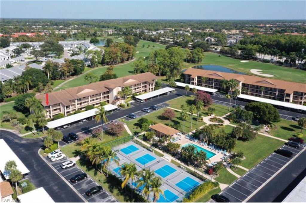 7360 St Ives Way, Unit 2205 Naples, FL 34104 - Photo 36 of 37 an aerial view of a city