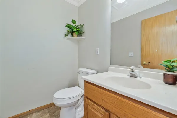a bathroom with a sink and a toilet