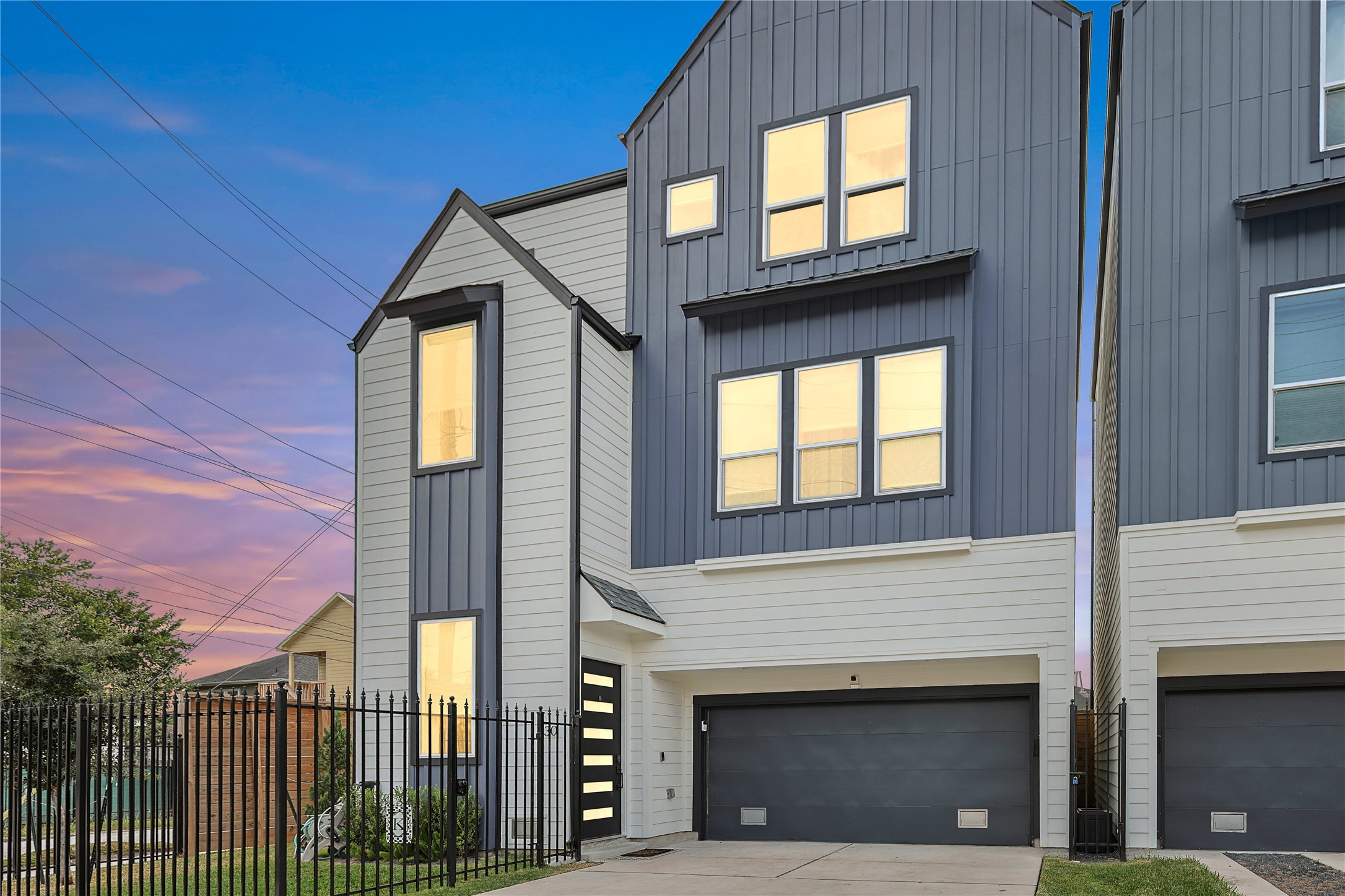 a front view of a house with a garage