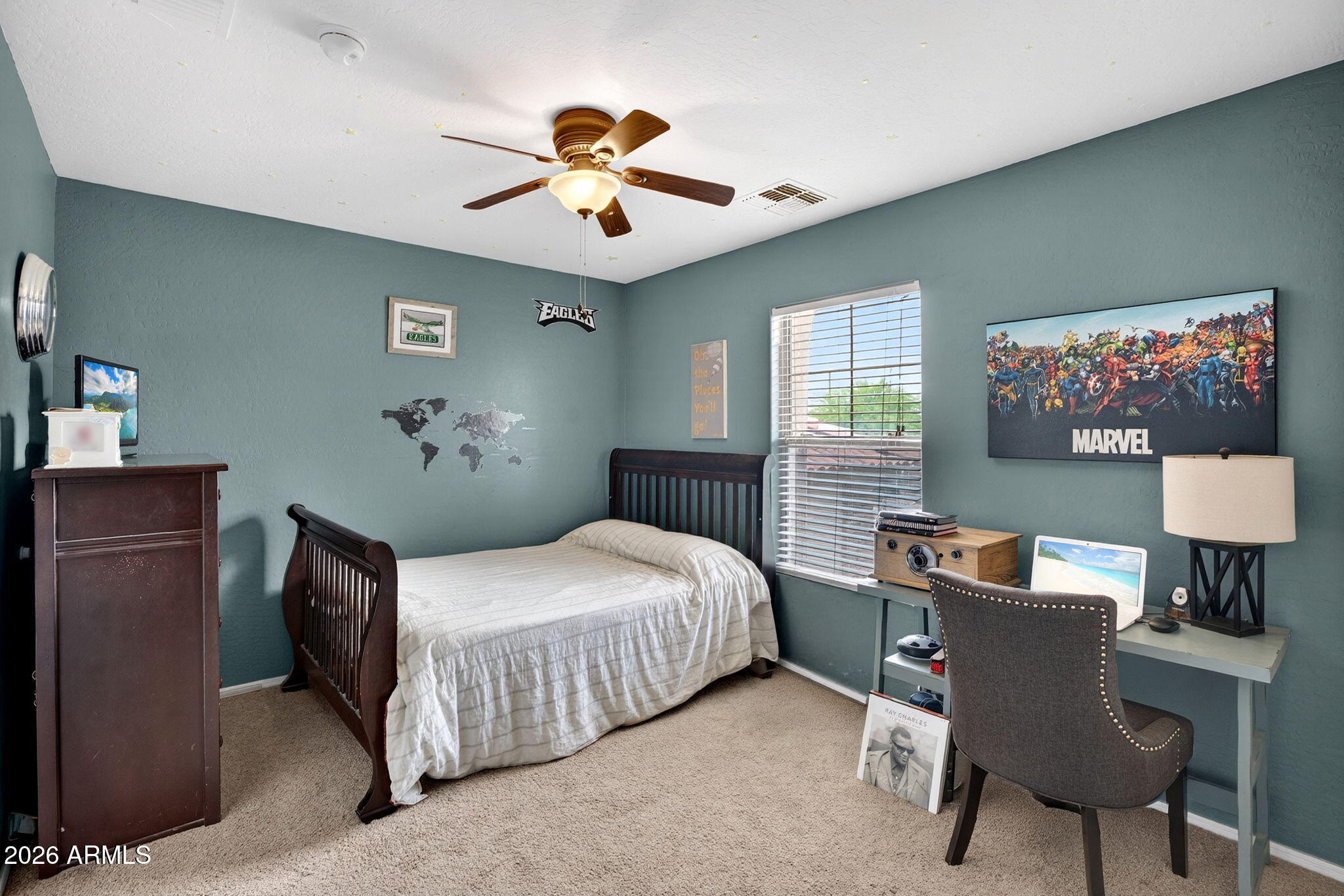 6280 South Sinova Court Gilbert, AZ 85298 - Photo 42 of 64 a bedroom with a bed and a chandelier