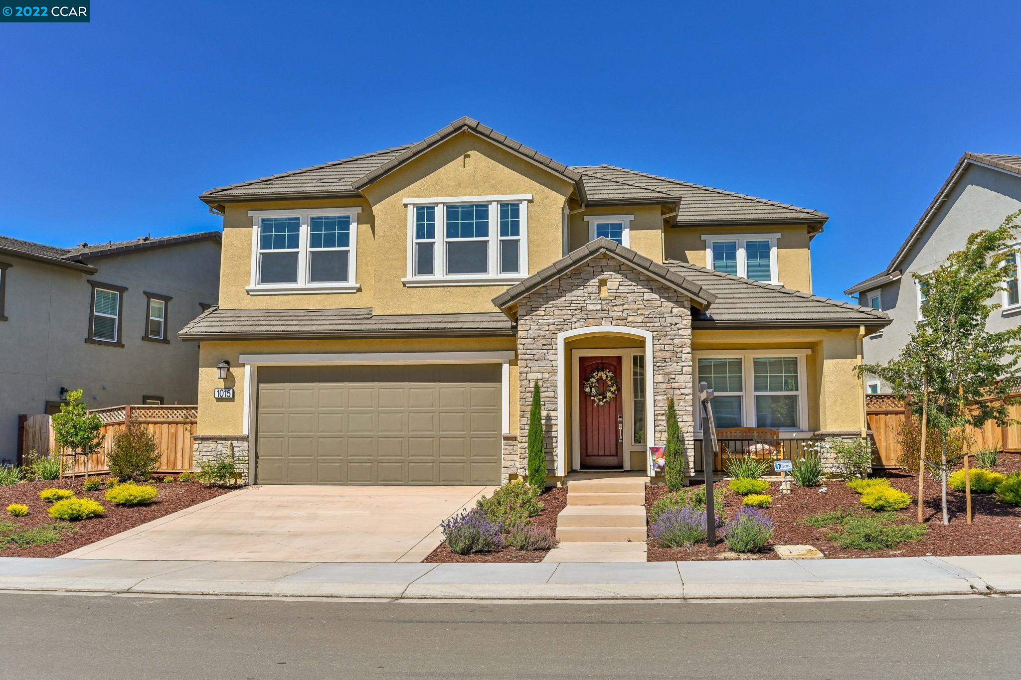 1015 Via Veneto San Ramon, CA 94526 - Photo 1 of 1 a front view of a house with a yard and garage