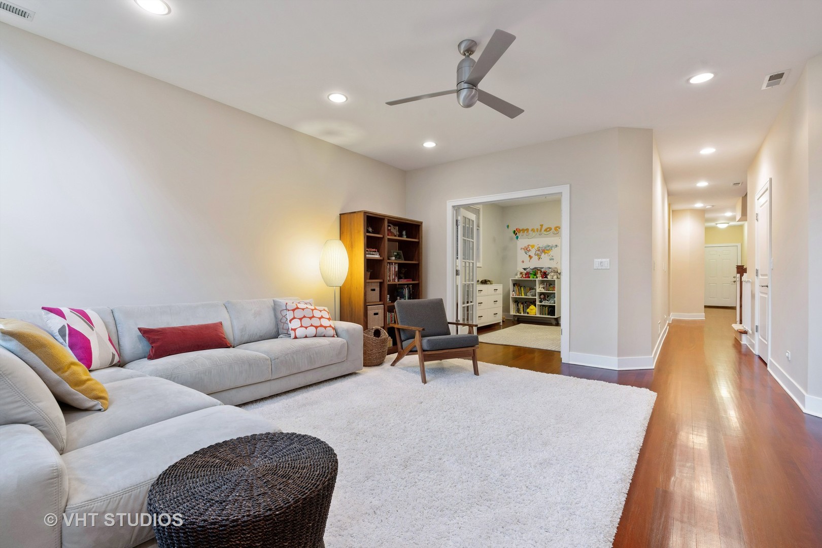 Undisclosed Address Chicago, IL 60622 - Photo 11 of 25 a living room with furniture and a wooden floor