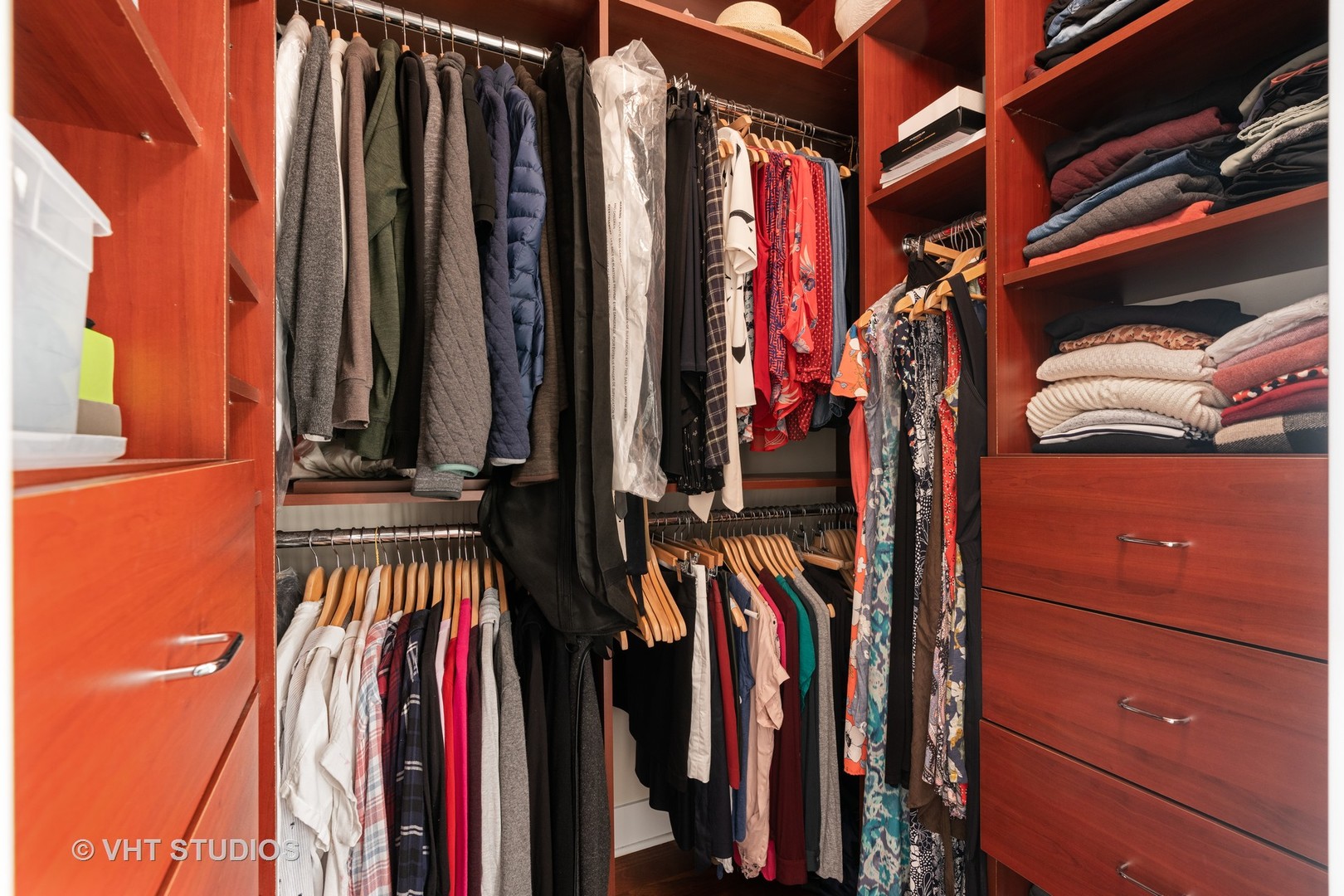 Undisclosed Address Chicago, IL 60622 - Photo 15 of 25 a view of walk in closet with clothes and shoes