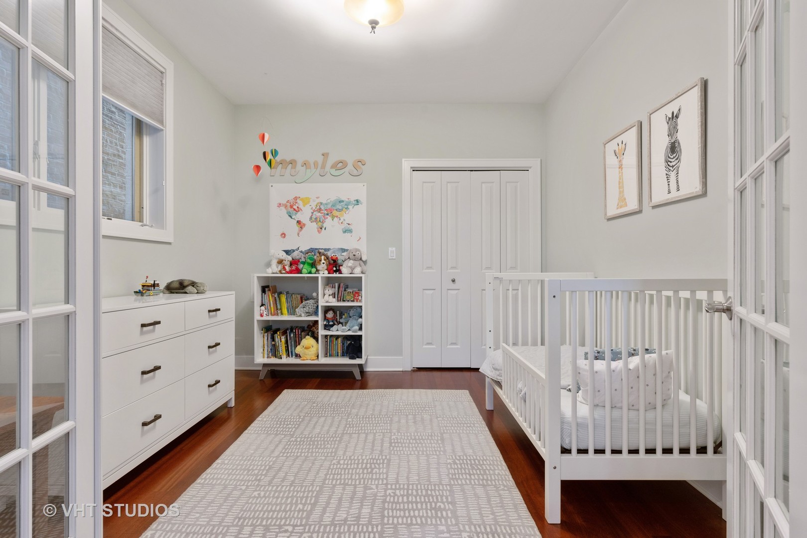 Undisclosed Address Chicago, IL 60622 - Photo 16 of 25 a bedroom with furniture and baby crib