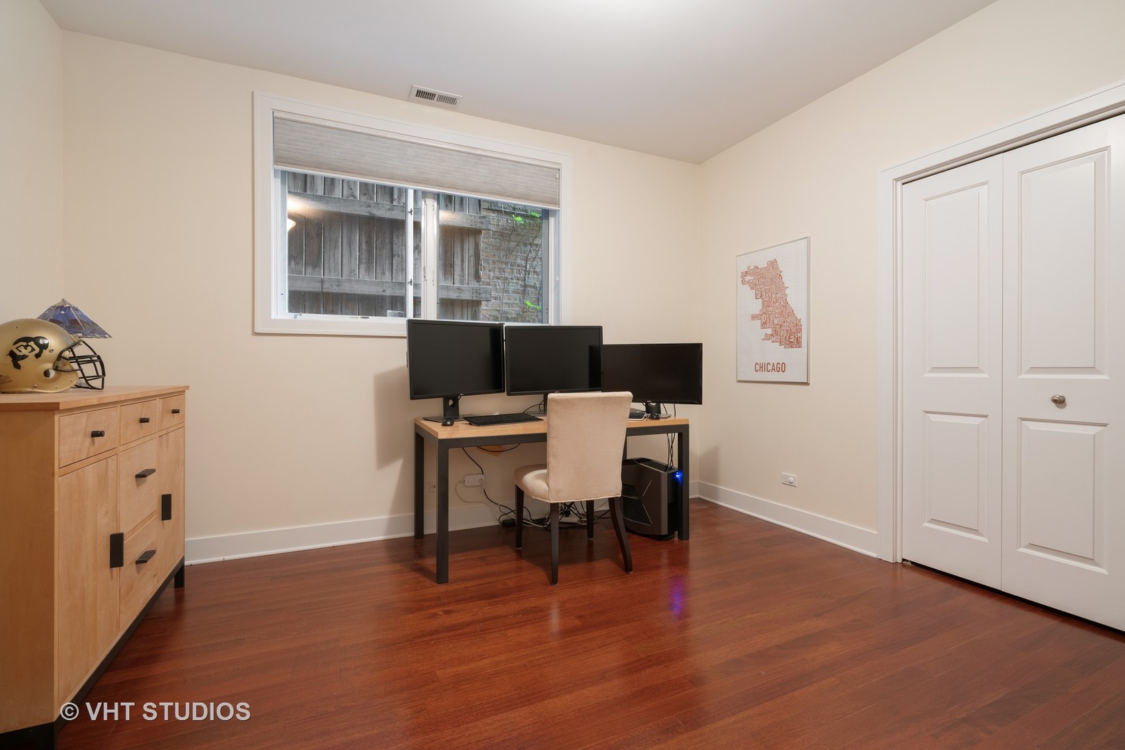 Undisclosed Address Chicago, IL 60622 - Photo 17 of 25 a view of a workspace with furniture and wooden floor