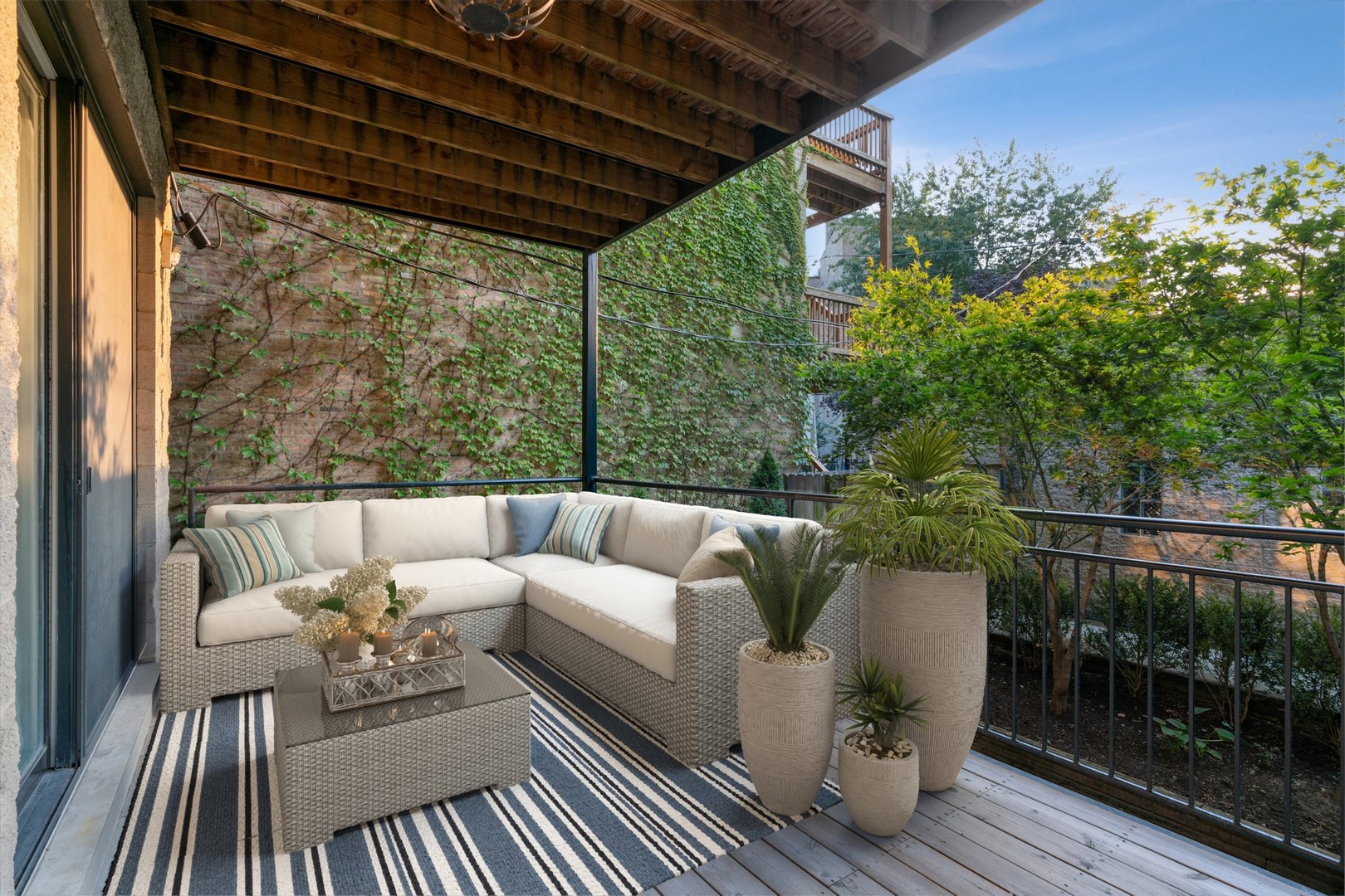 Undisclosed Address Chicago, IL 60622 - Photo 21 of 25 a roof deck with couches and wooden floor