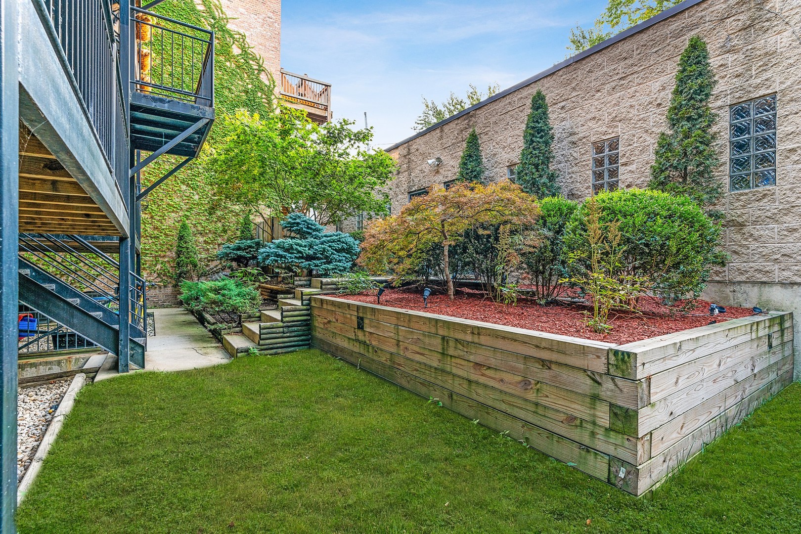 Undisclosed Address Chicago, IL 60622 - Photo 22 of 25 a view of a backyard with sitting area