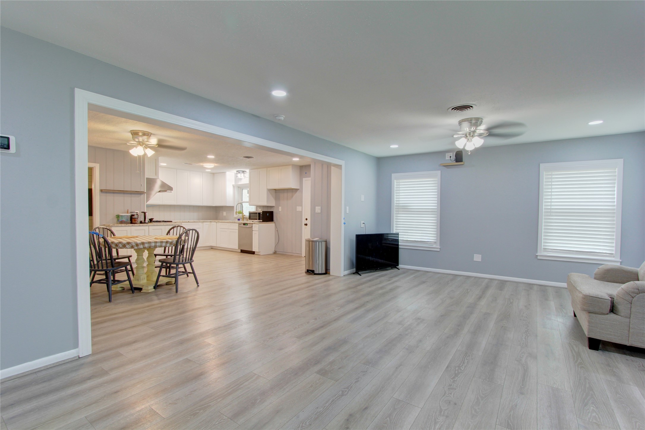 1904 Pine Street Liberty, TX 77575 - Photo 11 of 33 a view of kitchen with furniture and wooden floor