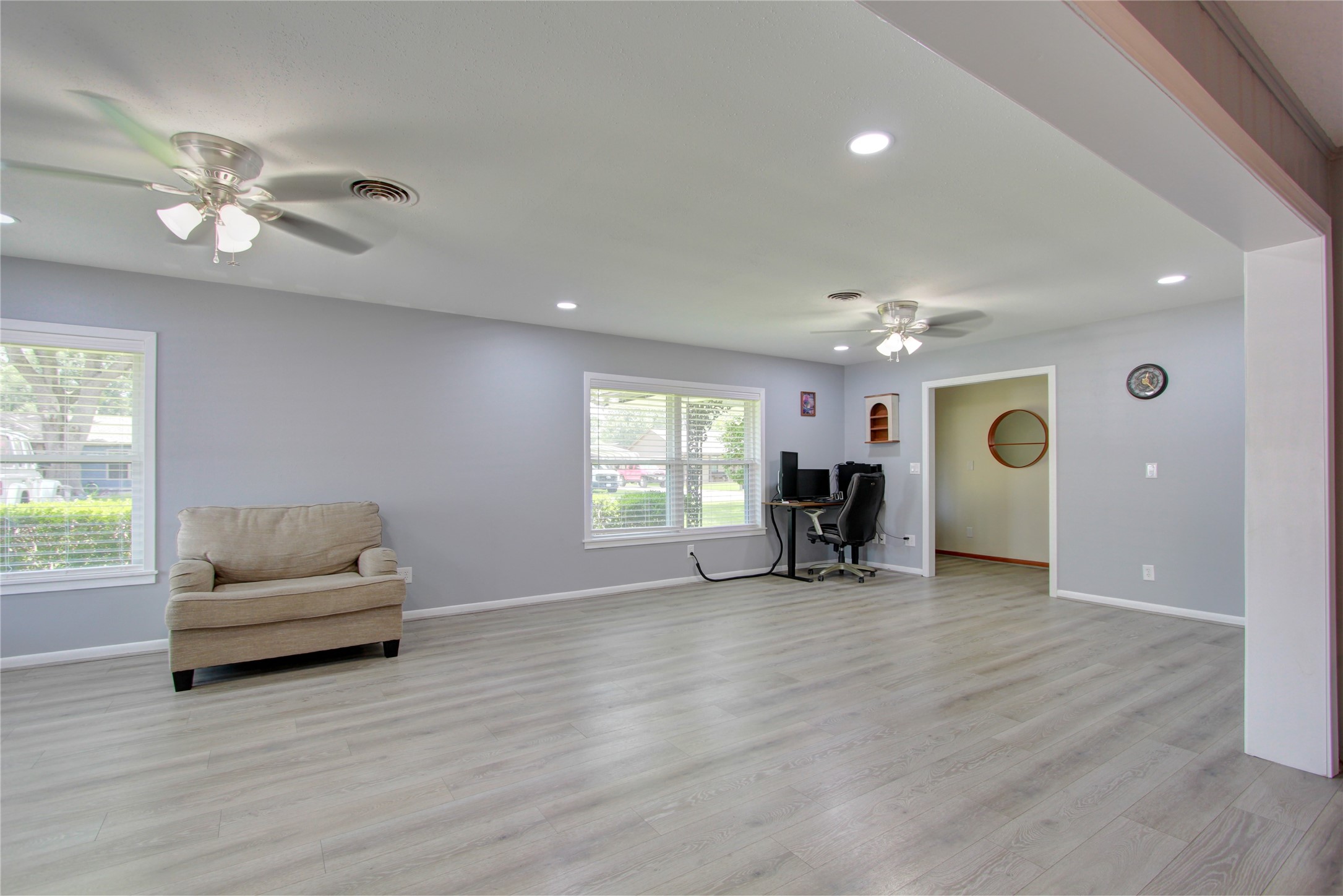 1904 Pine Street Liberty, TX 77575 - Photo 12 of 33 a living room with furniture and a chandelier